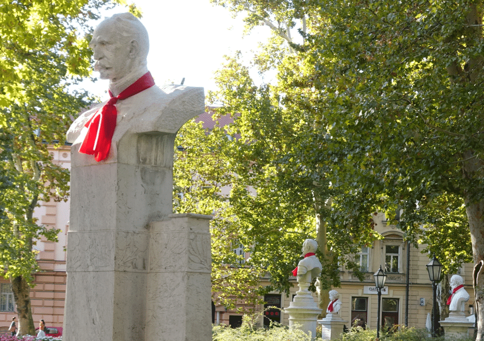 Statues in a park in Zagreb wearing ties